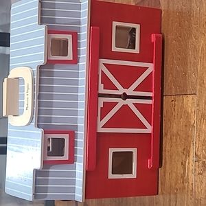 Melissa and Doug Barn toy with animals.